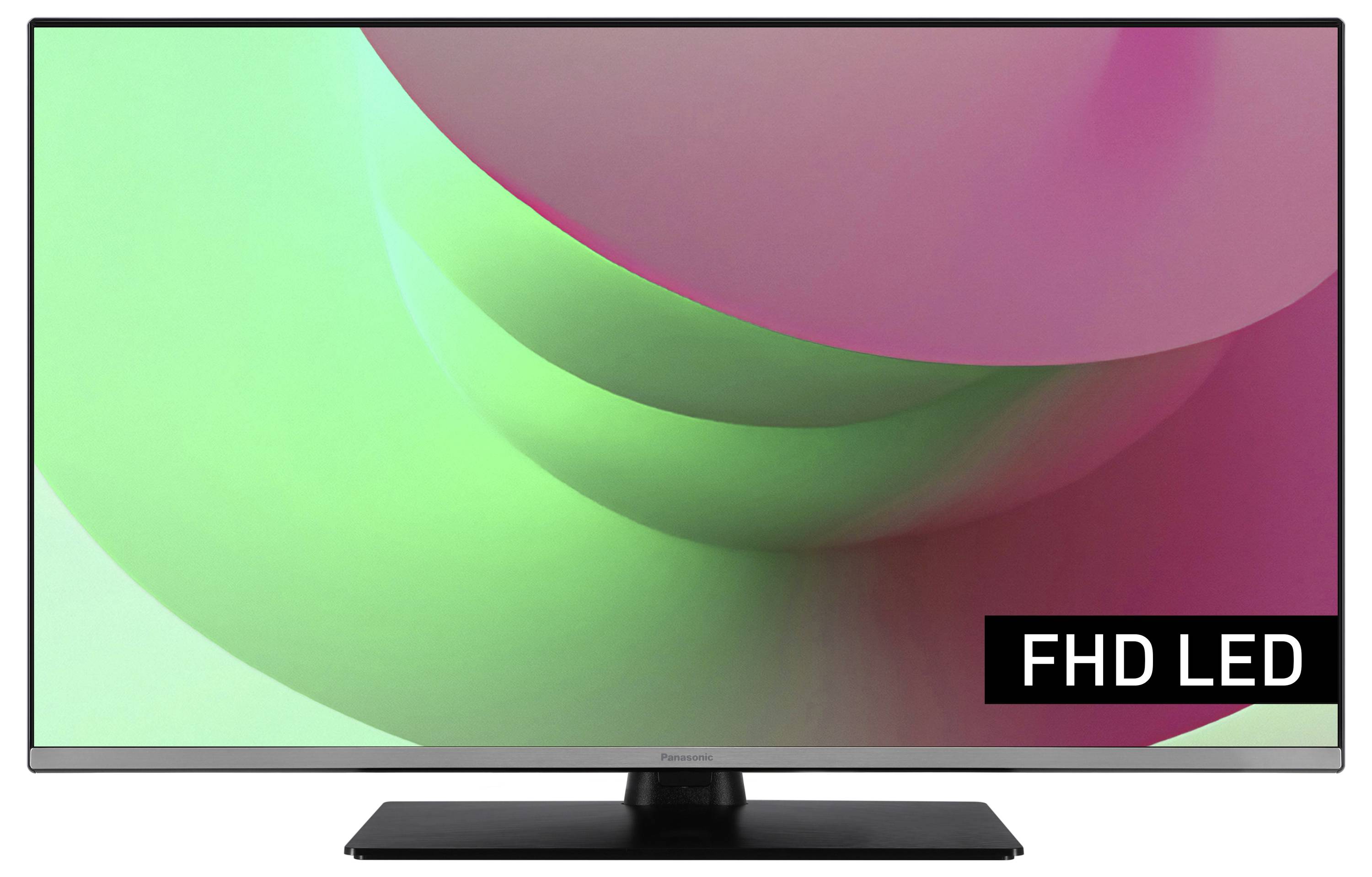 Flat-screen television with a silver frame, black stand, and a brightly green-pink screen. 'FHD LED' text visible.