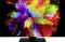 A vibrant colour spectrum that looks like an explosion of clouds in radiant colours, against a dark background.