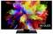 A television screen displays a vibrant, colourful, abstract pattern. '4K OLED' inscription in the bottom right corner.