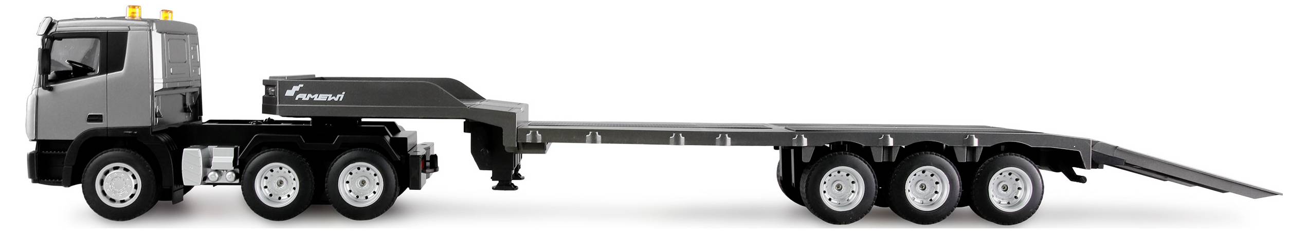 A grey, six-wheeled flatbed recovery vehicle, suitable for transporting large vehicles or machinery.