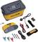 A yellow measuring device with a screen, various cables and clips, a charger, a carry strap and a tool box.
