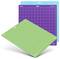 Three cutting mats layered on top of each other: green (StandardGrip), purple (StandardGrip), blue (LightGrip), all with a grid pattern, for crafting.