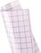 A rolled-up white film with a pink checked pattern.
