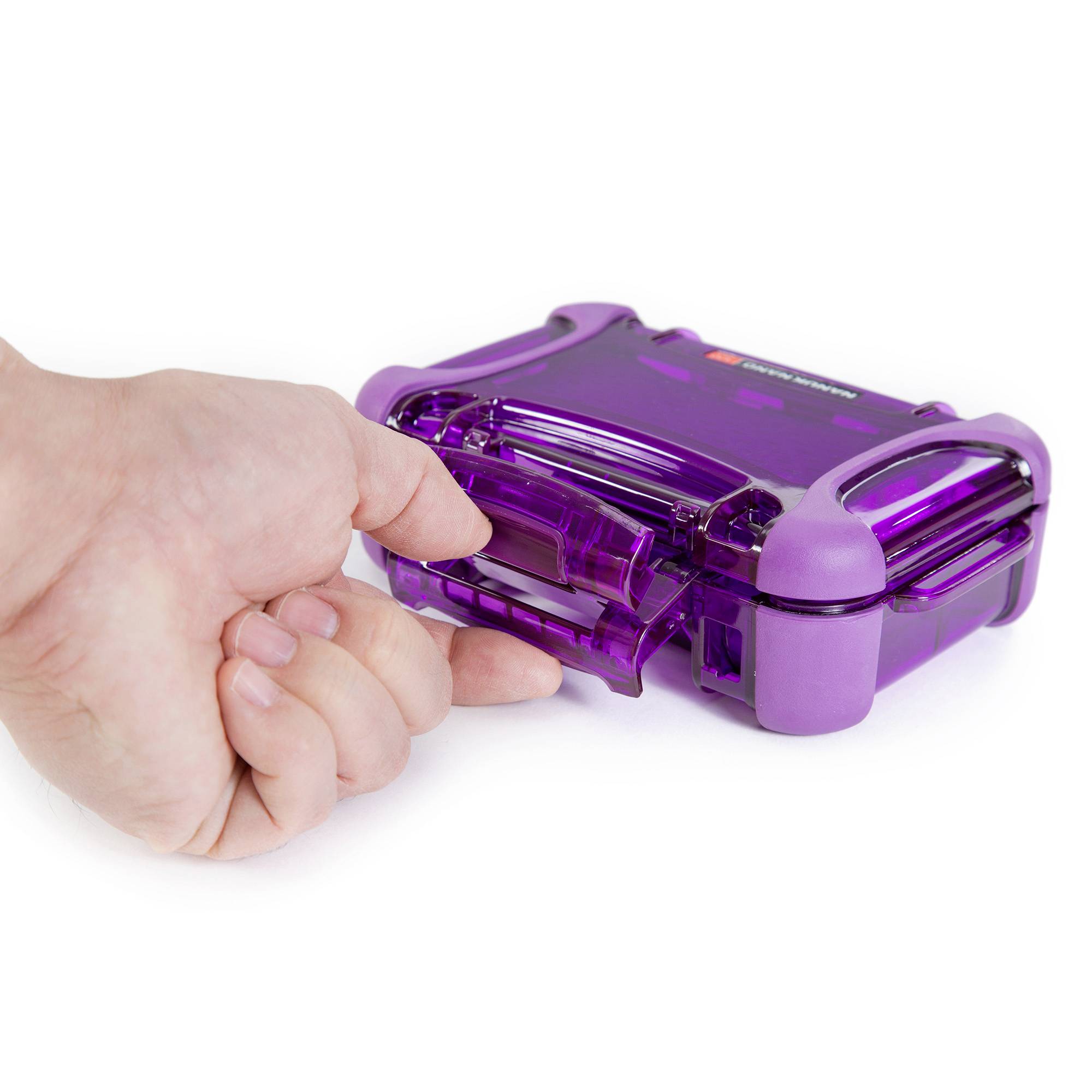 A purple, translucent box is smashed with a fist. The box is small and made of plastic.