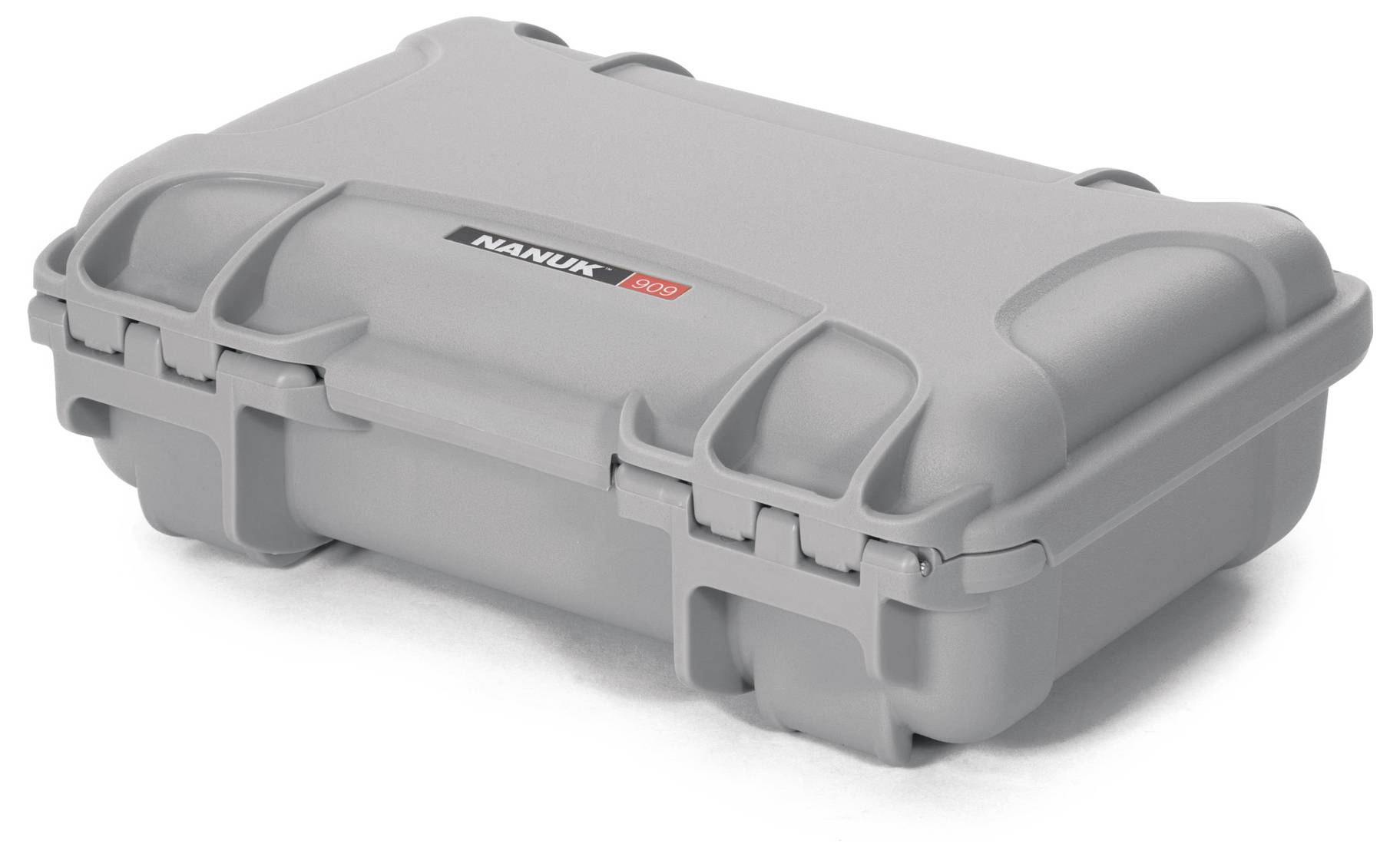 Grey, robust hard-shell suitcase with rounded corners and locks, suitable for secure transportation and protection of items.