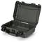 A hard-shell suitcase in dark grey, open and empty, with snap locks, suitable for transporting delicate items.