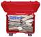 Red first aid box with open lid, filled with various medical items such as bandages, scissors and plasters.