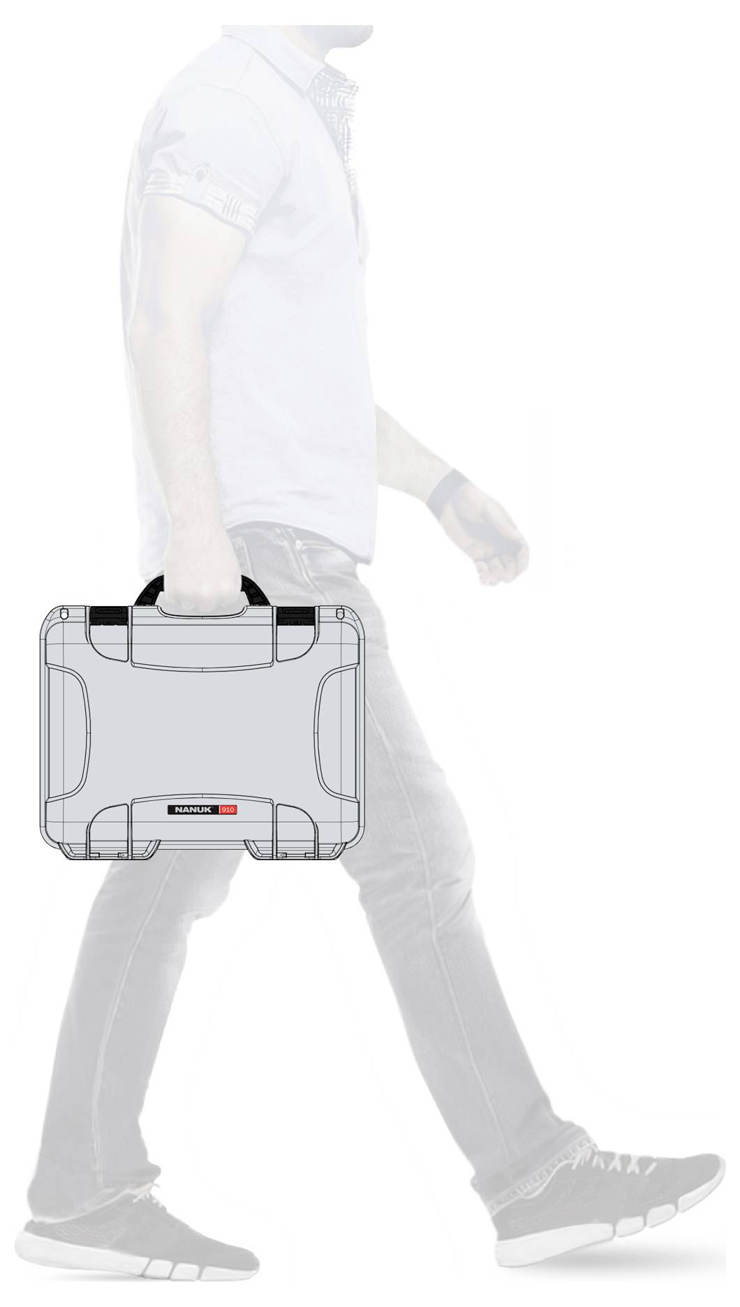 A person is carrying a silver-grey hard-shell suitcase in their right hand, the suitcase having a black handle and a small label.