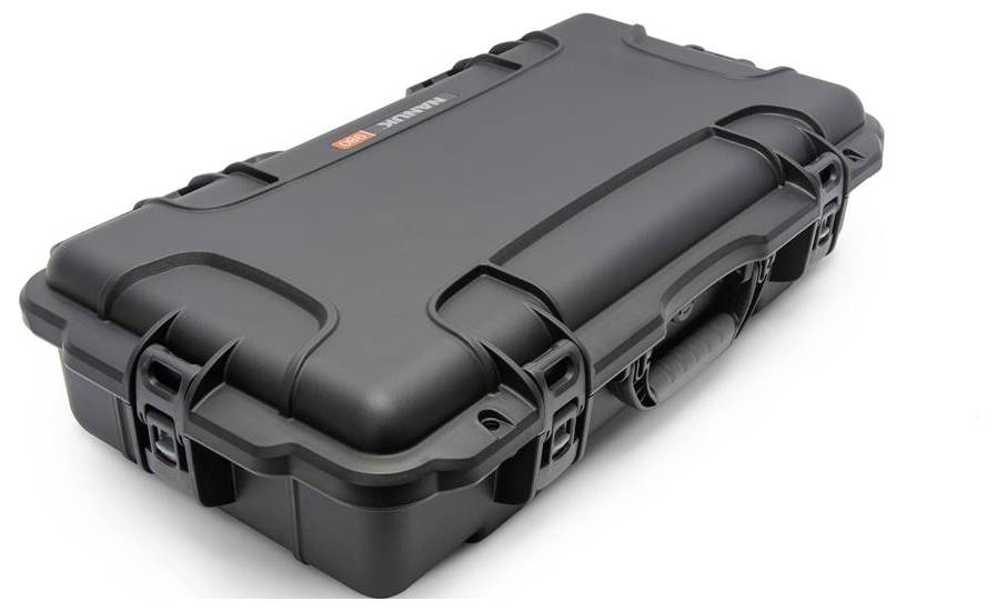 Black, robust hard-shell suitcase with handle and sturdy locks. Ideal for securely transporting delicate items.