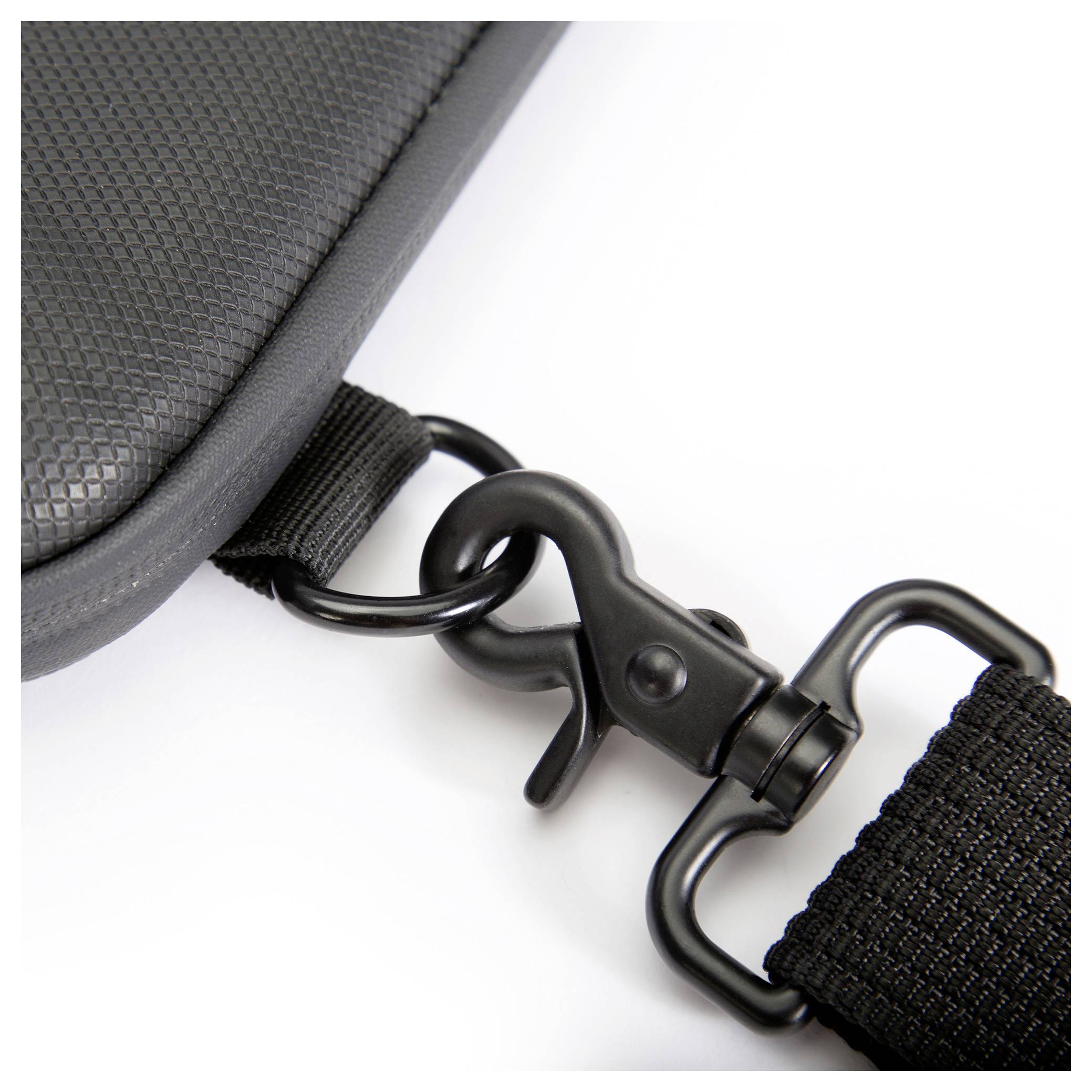 A black carabiner clip connects a woven strap to a structured, dark leather object.