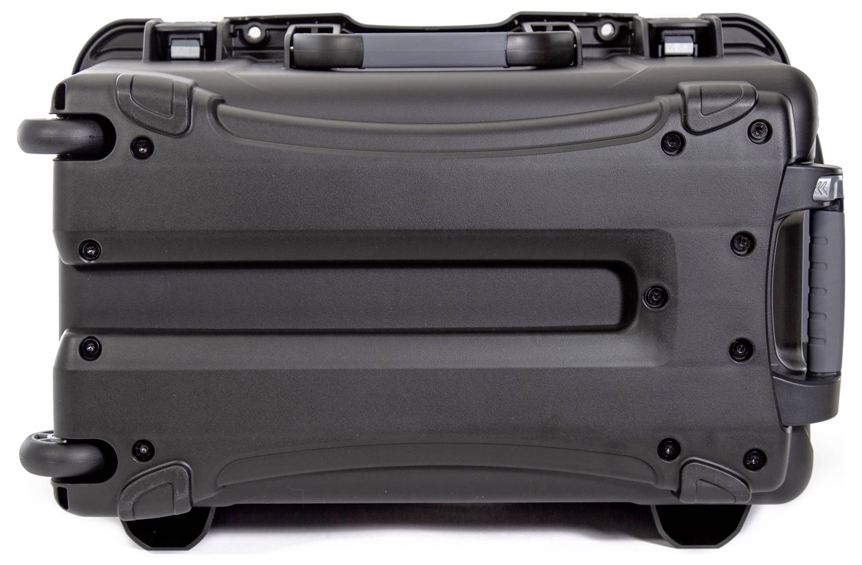 Black hard-shell suitcase with wheels and side handle lying on a light surface.