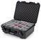 A black, open suitcase with grey, padded compartments for securely storing sensitive equipment or utensils.