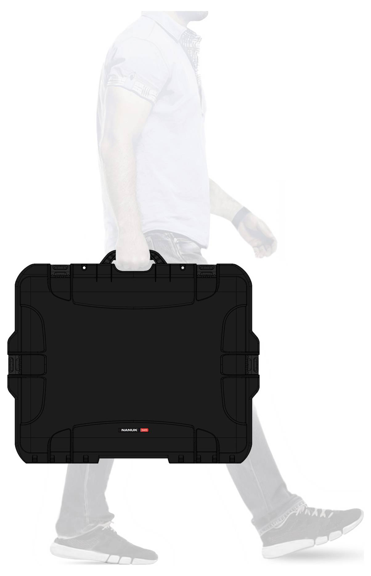 A person is carrying a large, black suitcase in their right hand. The suitcase is wide and rectangular.