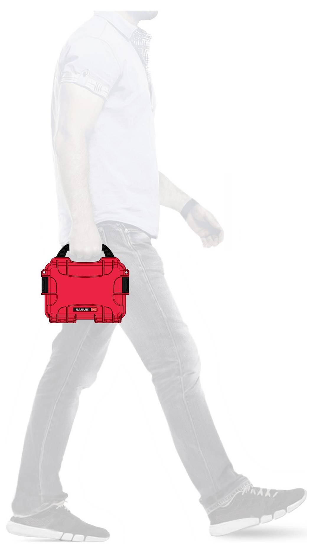 A man is carrying a red toolbox in his hand and walking.