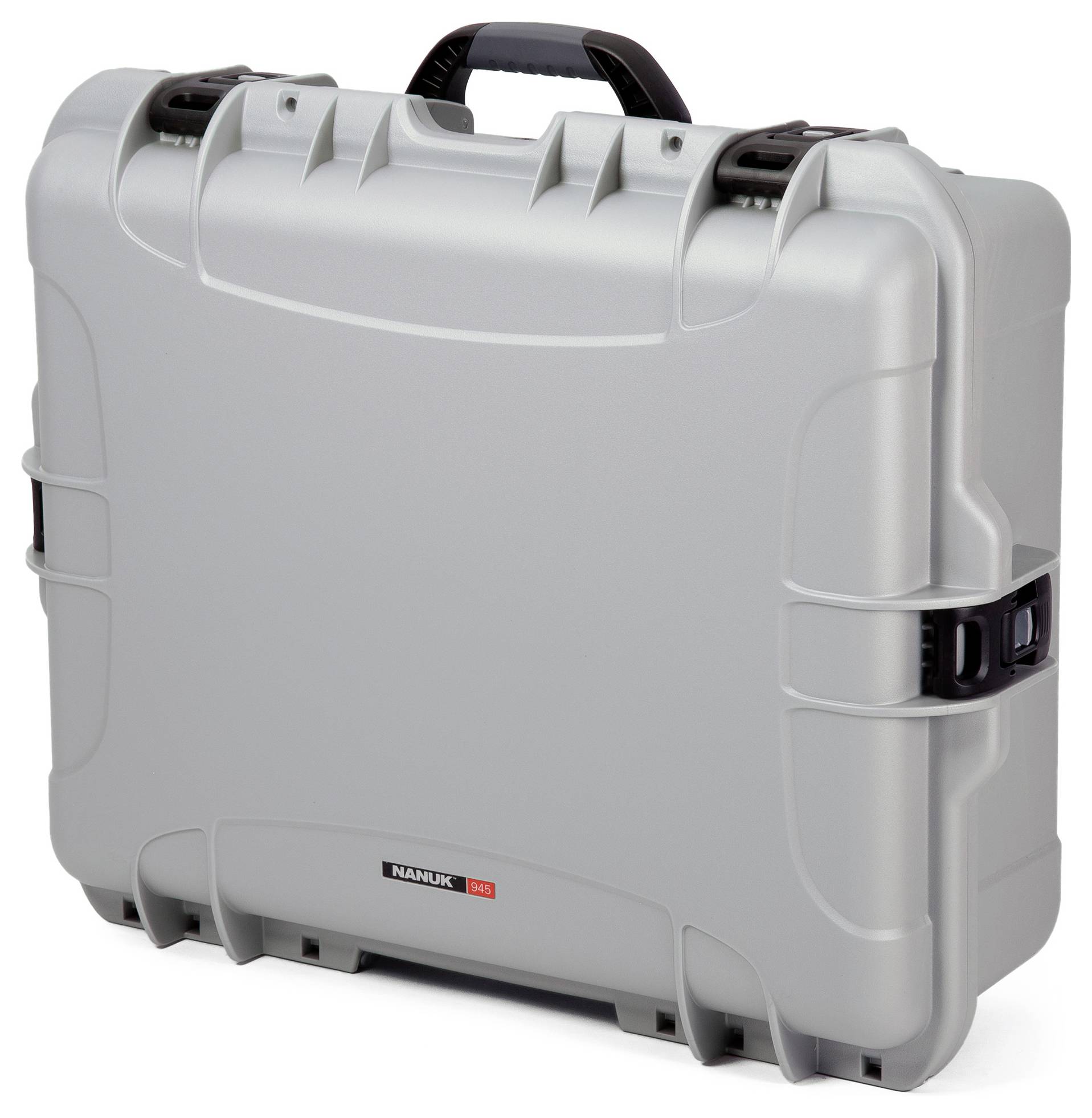 Silver hard-shell suitcase with black handle, robust design, ideal for securely transporting delicate equipment.