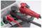 'Close-up of cable connections in red and black on an electrical testing device.'