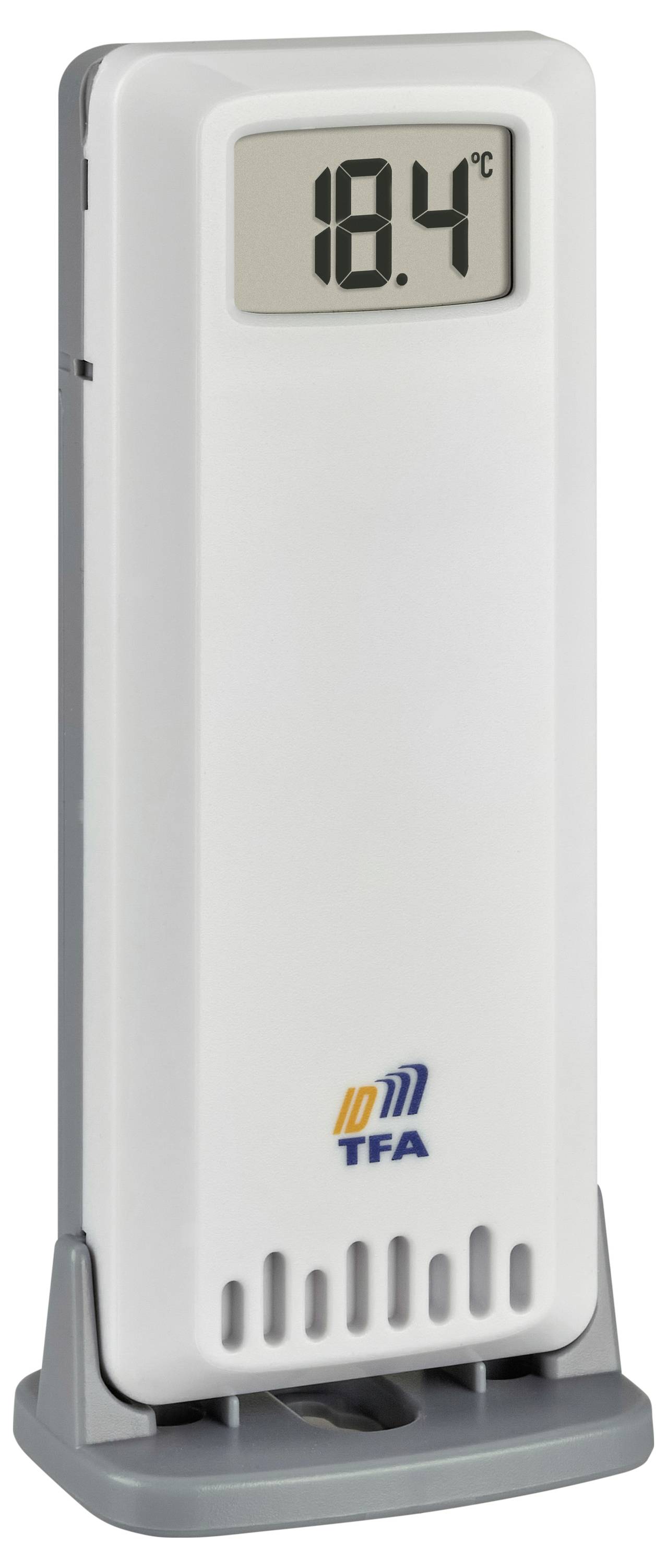 Digital thermometer display showing '18.4°C', plastic casing, placed in grey holder, brand logo at the bottom.