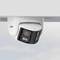 Security camera mounted on the ceiling, visible in the rain.