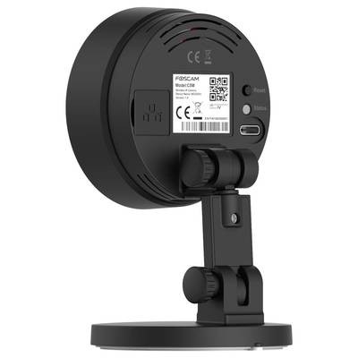 Rear view of a black surveillance camera on a table stand, showing the brand logo and model code on a label.