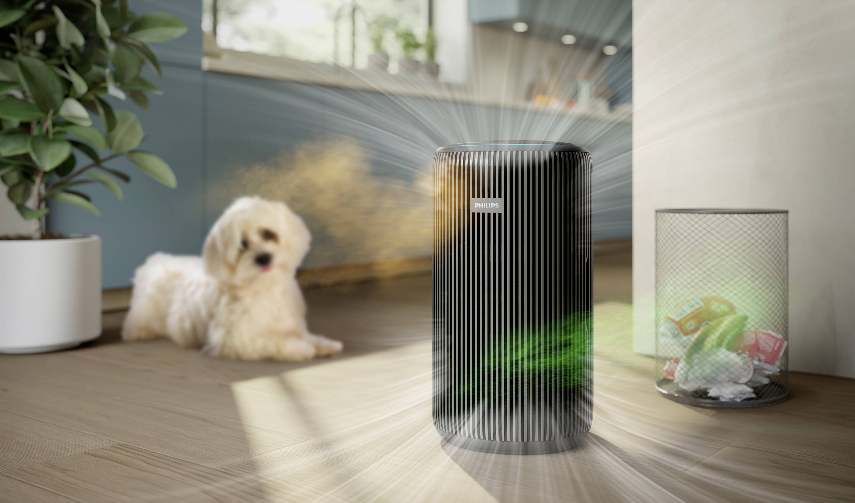 An air purifier stands in front of a dustbin overflowing with rubbish, in a room with a small dog. The purifier is emitting clean air.