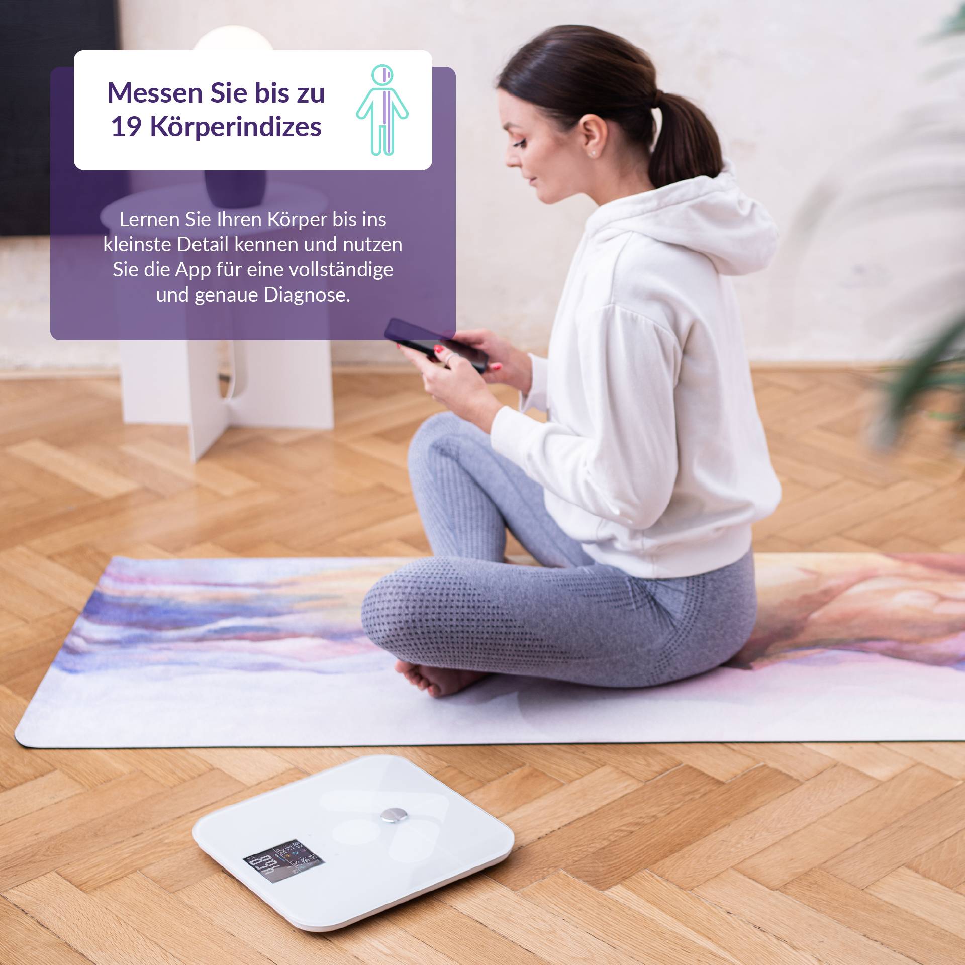 A woman sits on a yoga mat and looks at her smartphone. Weighing scales nearby. Text field: 'Measure up to 19 body indices'.