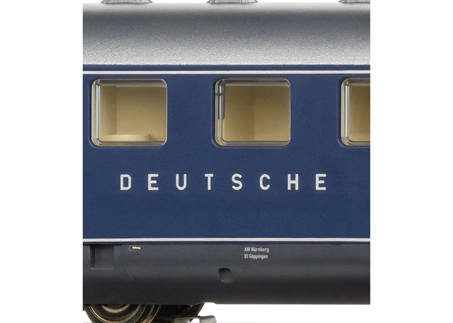Blue railway carriage with the inscription 'DEUTSCHE' in white letters, two visible windows, scale model.