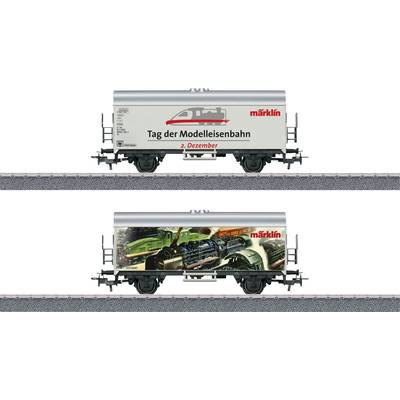 Model railway carriages by Märklin. Above: 'Model Railway Day, 2nd December'. Below: Image with trains.