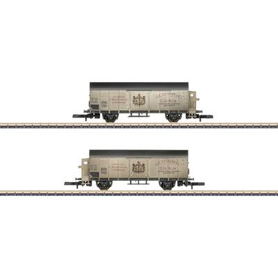 Two model freight wagons on tracks, one above the other. Both grey with red inscriptions and emblem. Track details visible.