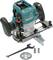 Makita router with two handles, depth adjustment, accompanying tools and accessories, suitable for precise woodworking.
