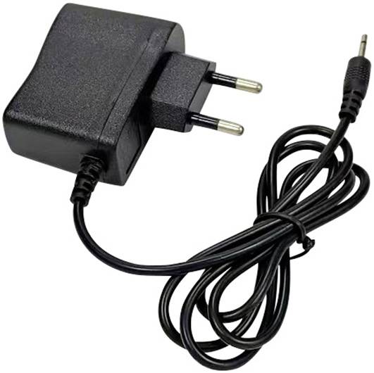 A black power adapter with a European plug and a long cable that terminates in a round connector. It is used for charging devices.