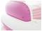 A pink and white inflatable object, most likely a swimming ring or an air mattress, in close-up.