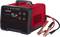 Red battery charger 'Voltcraft VC-AL-150' with digital display, 12V/24V setting and start function, terminals visible.