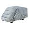 A campervan is completely covered with a grey, water-repellent cover that provides protection.