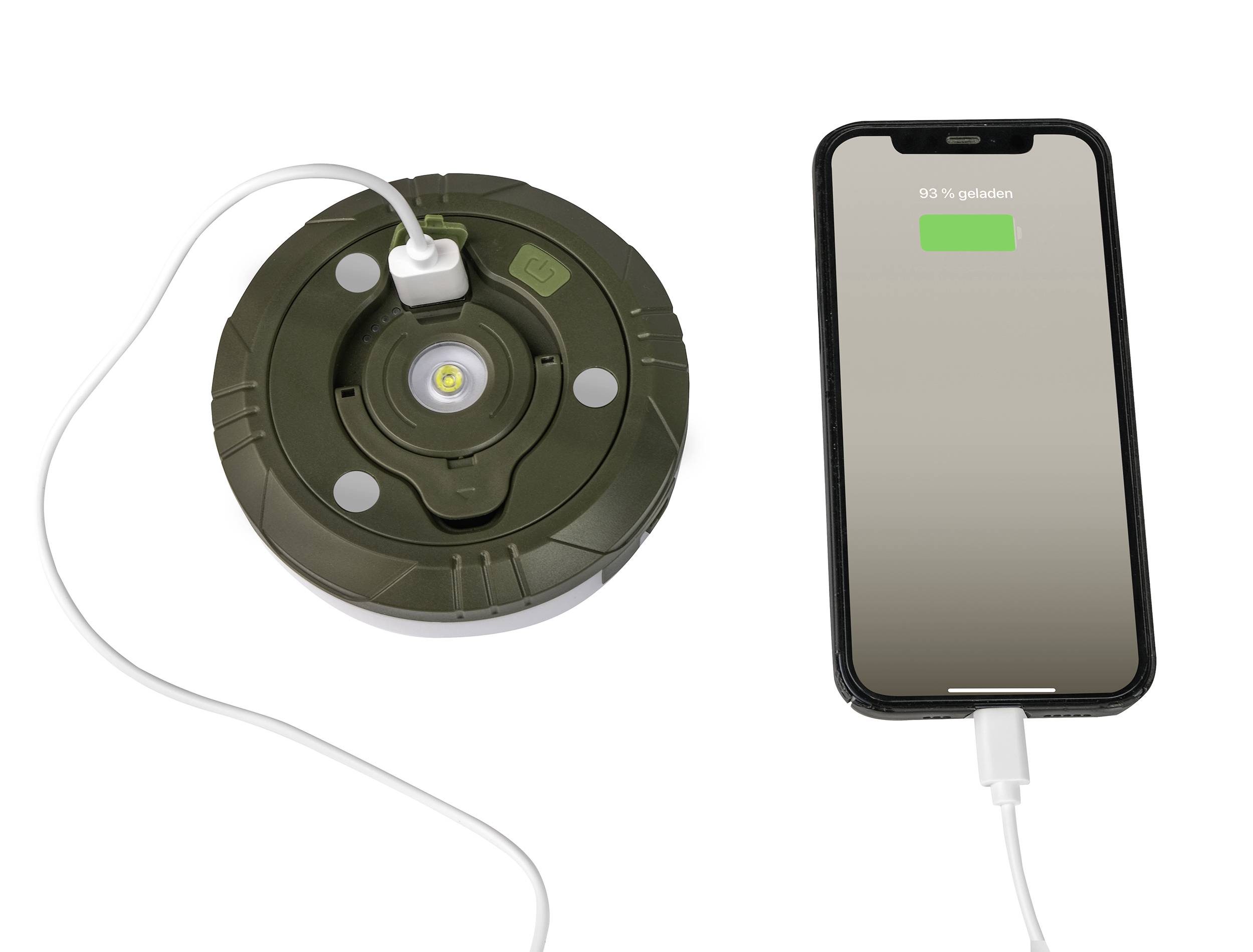 Smartphone charging on a round charging pad at 83% battery.