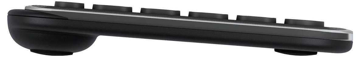 Black electronic device with seven round buttons in a row; side view reveals a slightly curved design.