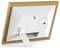 Back of a digital photo frame with a wooden border and stand, memory card slots and control buttons visible.