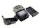 A foldable trail camera with a visible battery compartment and display, used for monitoring wildlife in nature.