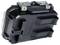 Black, weatherproof housing with camouflage elements, suitable for outdoor equipment. Includes mounting options at the rear.