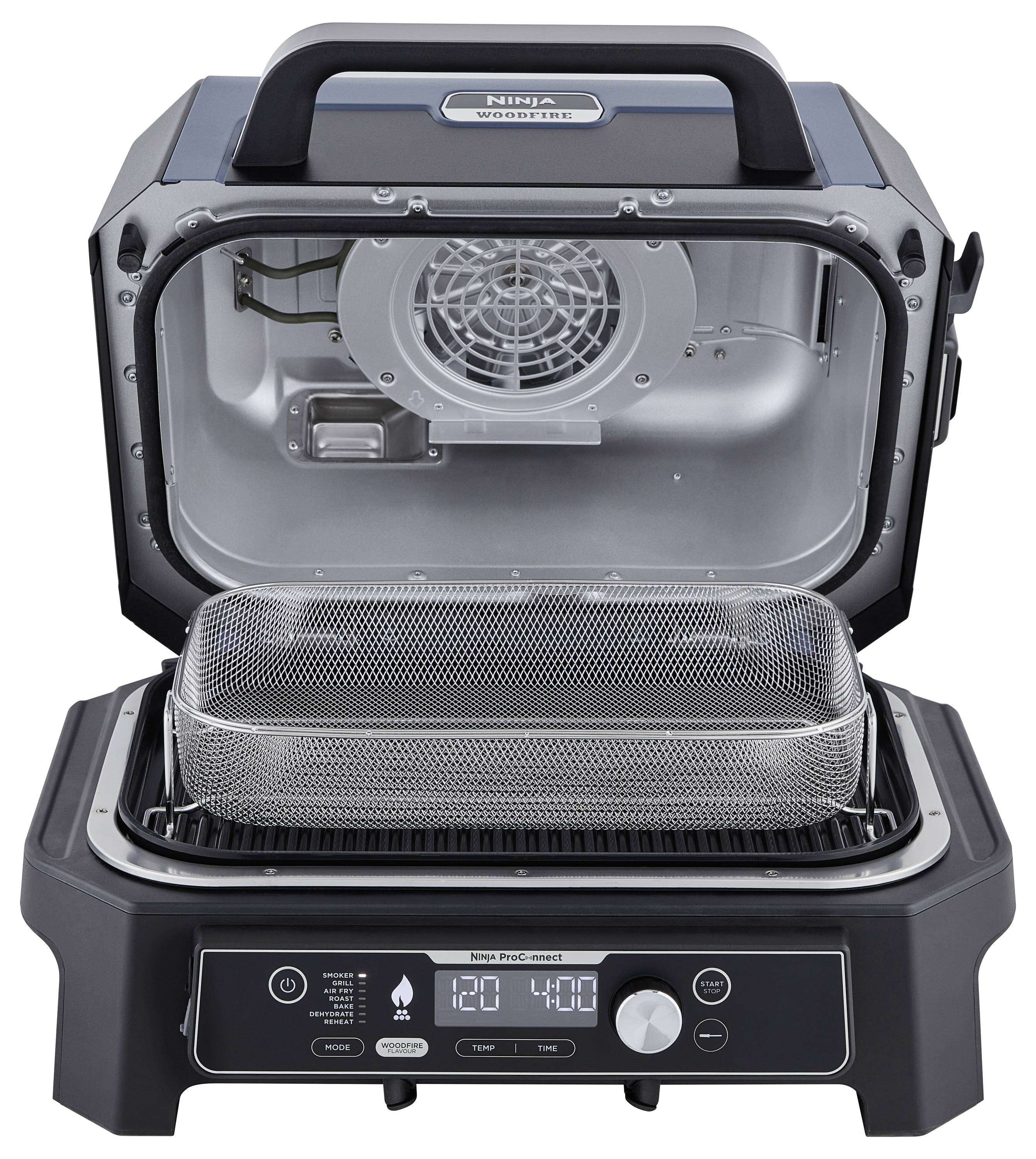 An electric barbecue in black and stainless steel finish with an open lid. The cooking chamber, a fan, and the control panel are visible.