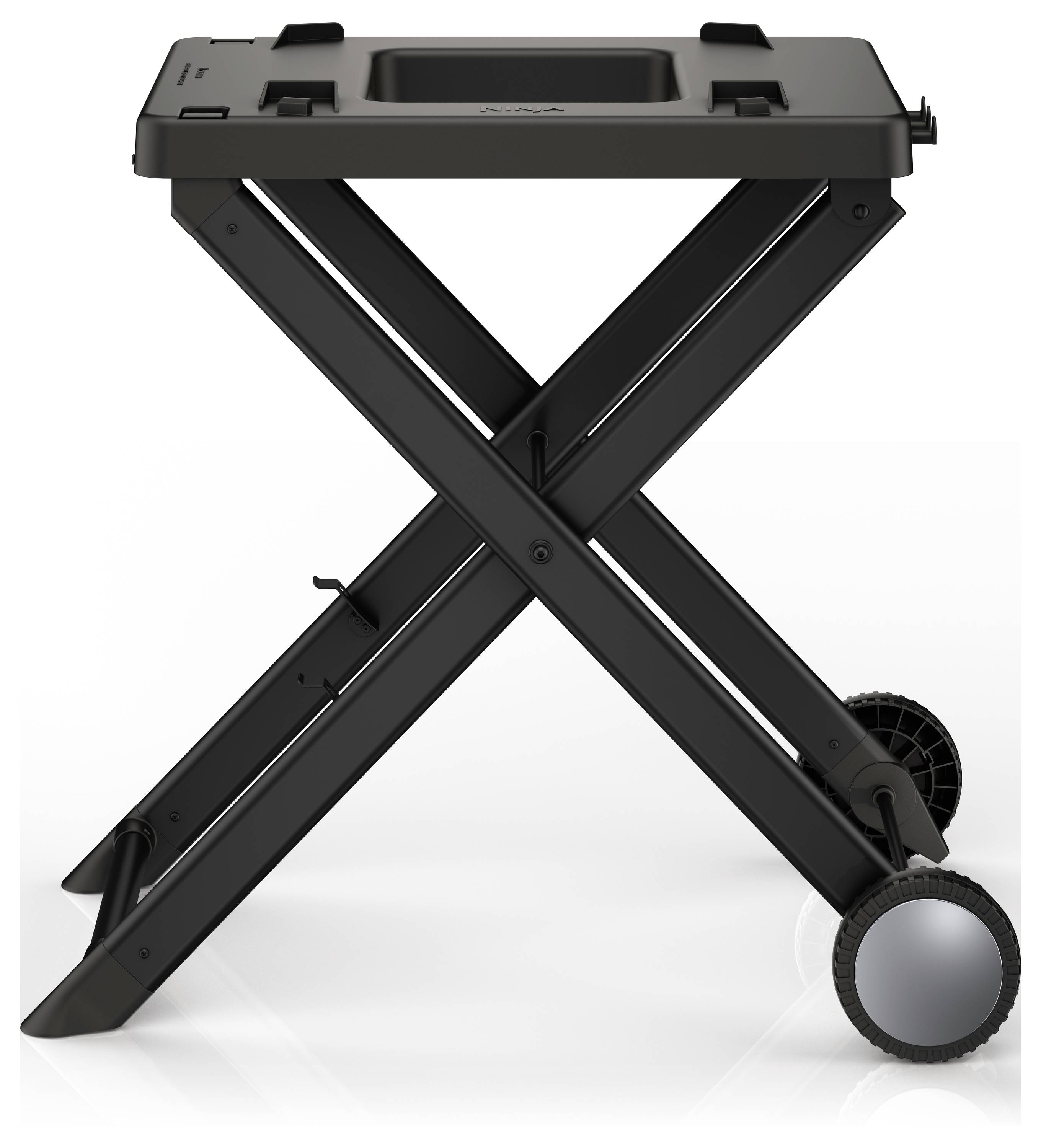 Black folding barbecue trolley with two wheels and X-shaped frame. Ideal for mobile barbecue stations.