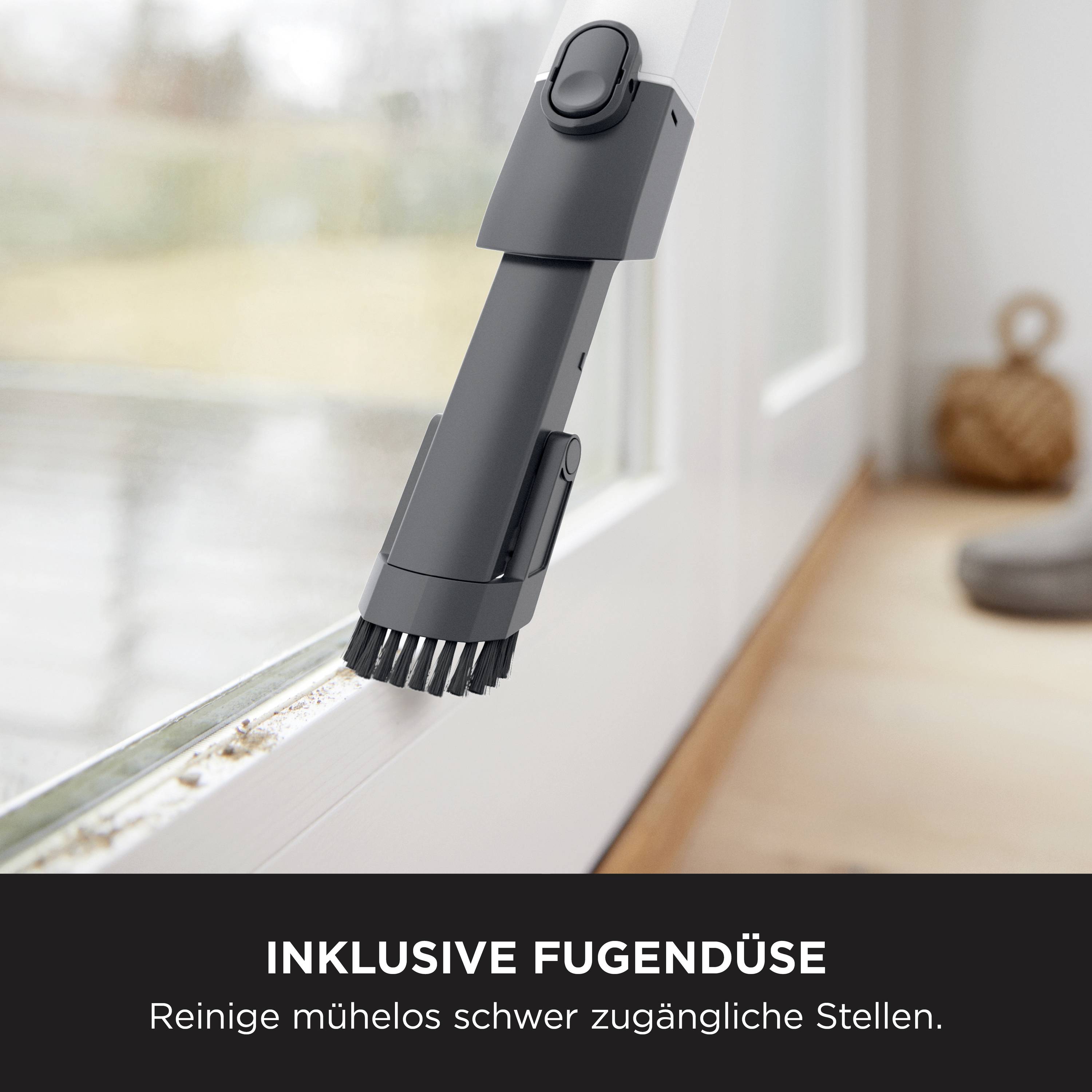 A nozzle for tight spaces effectively cleans the window frame groove. Subtitle: 'Includes precision nozzle - Effortlessly clean hard-to-reach areas.'