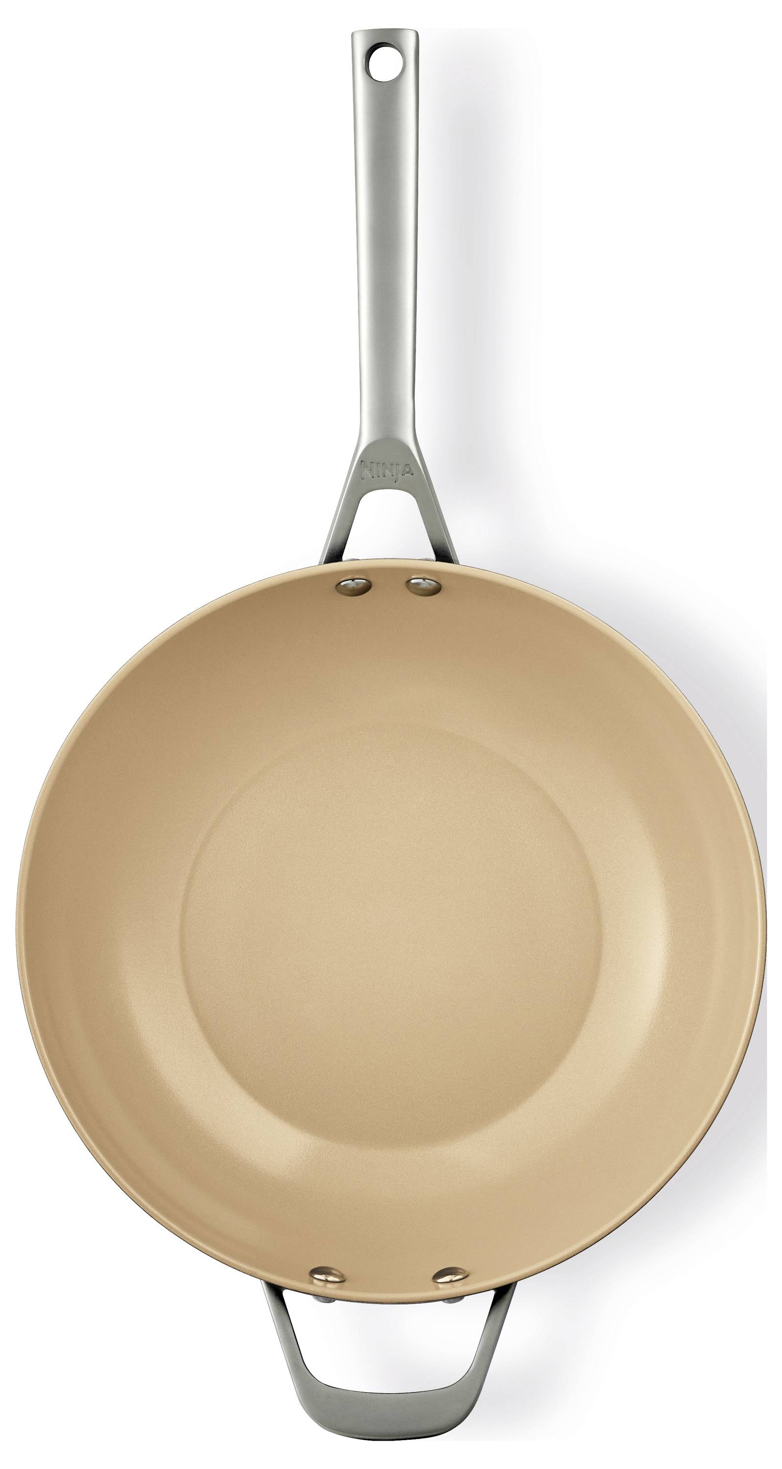 A non-stick, round frying pan with a long handle, in golden colour, on a white background. Primarily suitable for cooking.