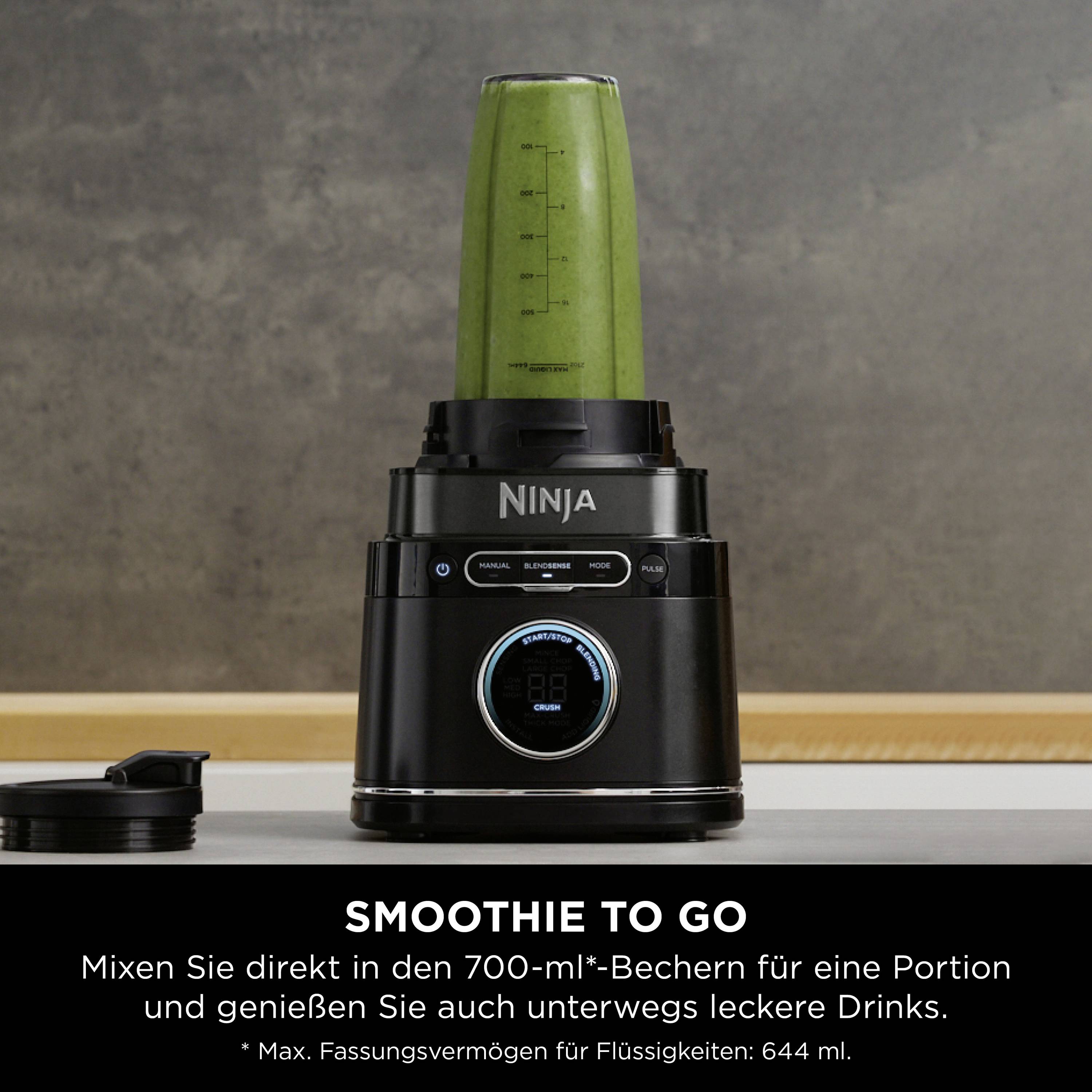 A green smoothie in a standing blender with a digital display. Text: 'Smoothie to go', 700-ml cup, enjoying drinks on the move.