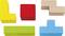 Five colourful wooden blocks are scattered about: a yellow L-shape, a red square, a natural-coloured Tetris piece, a green bar, and a blue T-shape.