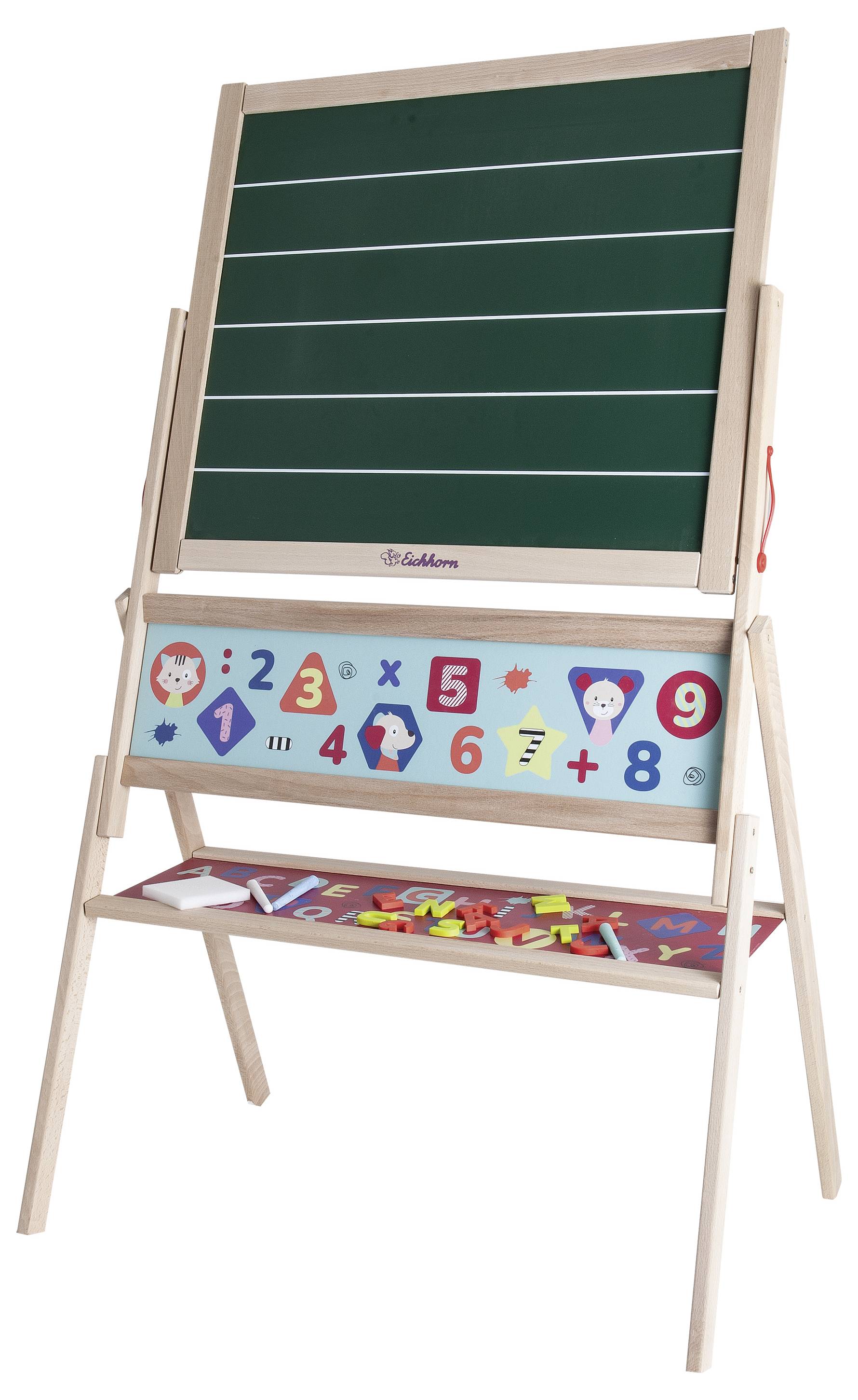 Wooden board with a white chalk stand, beneath it a ruler with numbers and drawings. Tray with coloured chalks and alphabet letters.