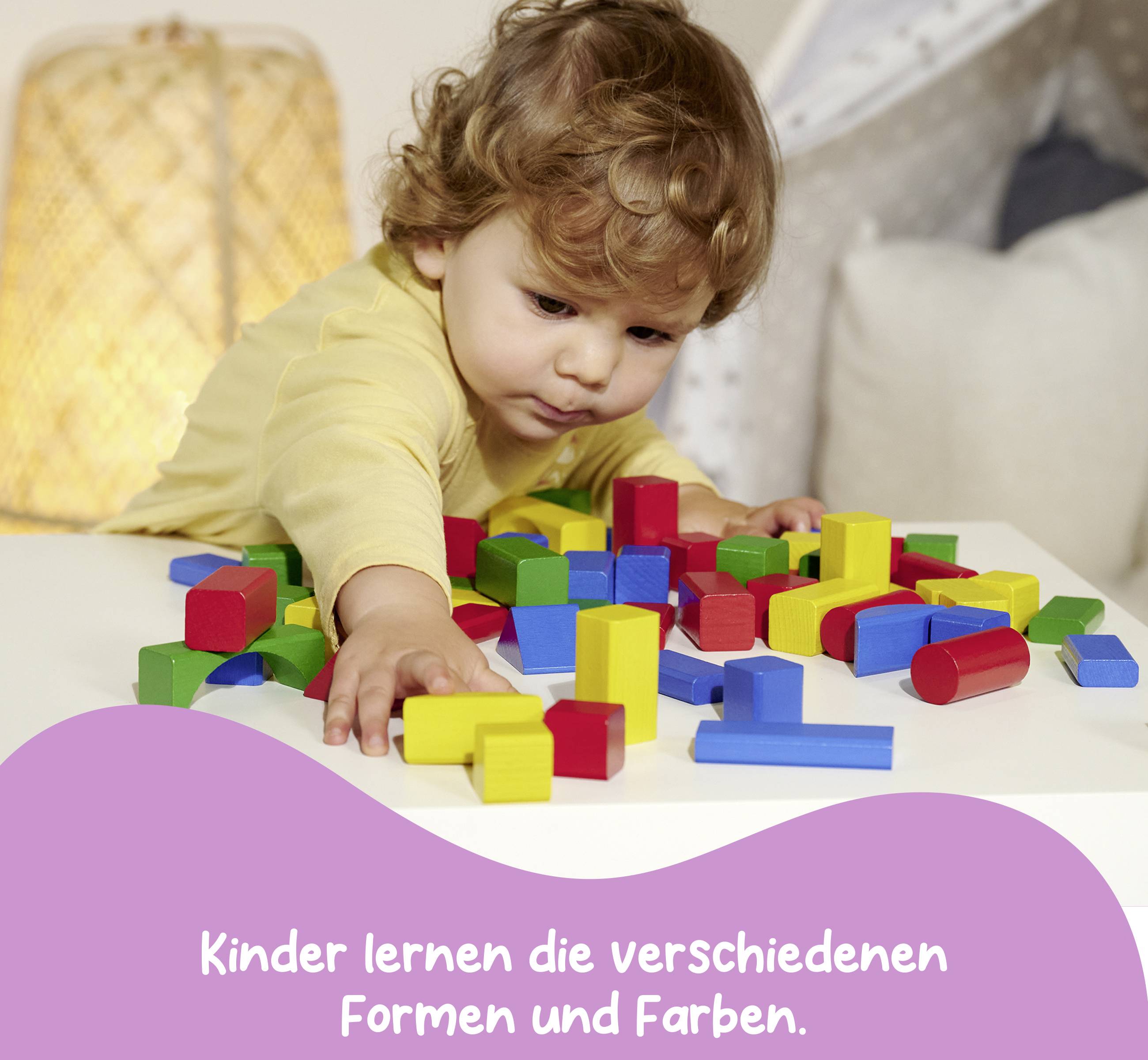 A child plays with colourful wooden blocks; Text underneath: 'Children learn about different shapes and colours.'