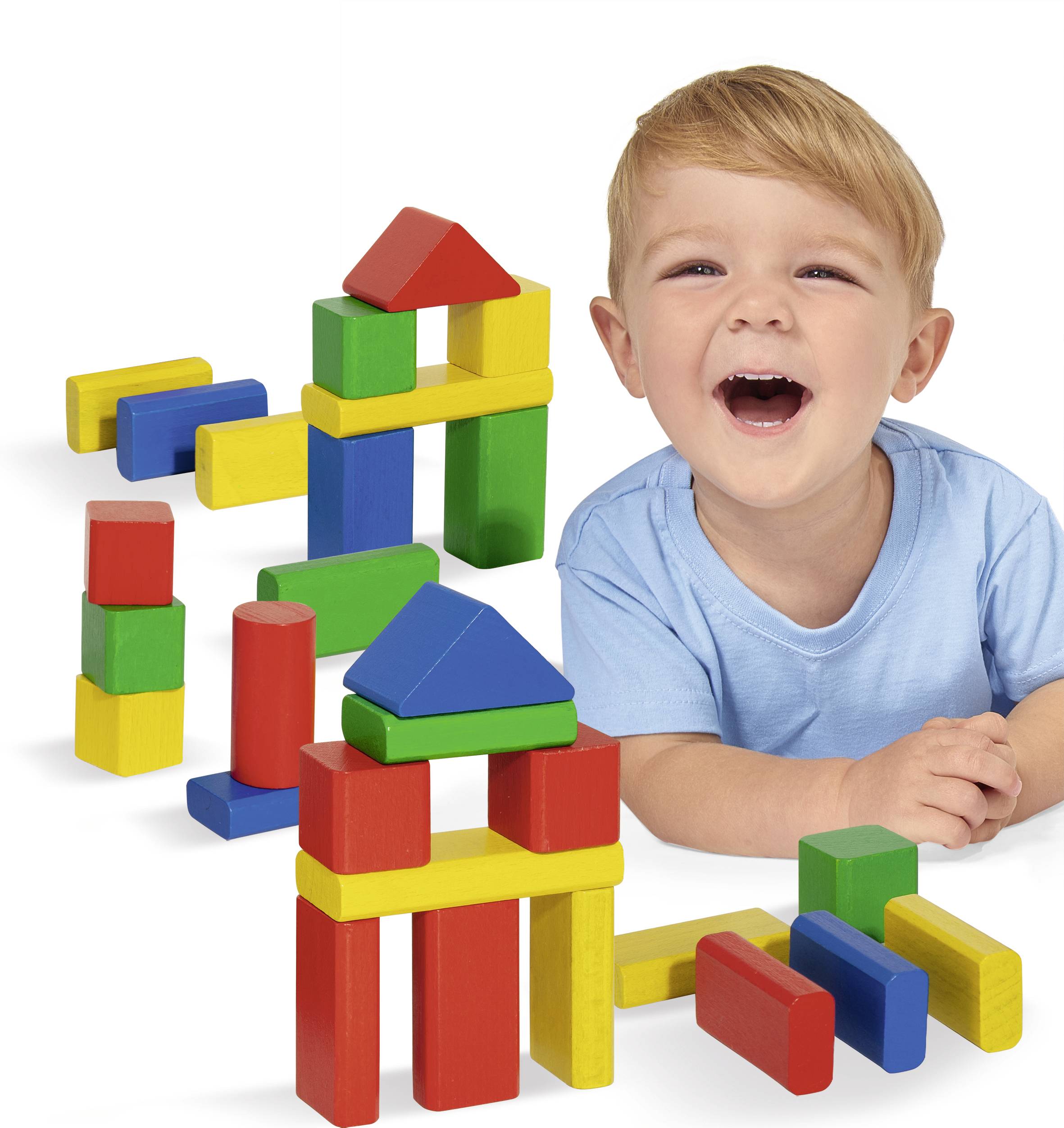 A child is laughing and playing with colourful wooden building blocks that have various shapes such as cubes and triangles.