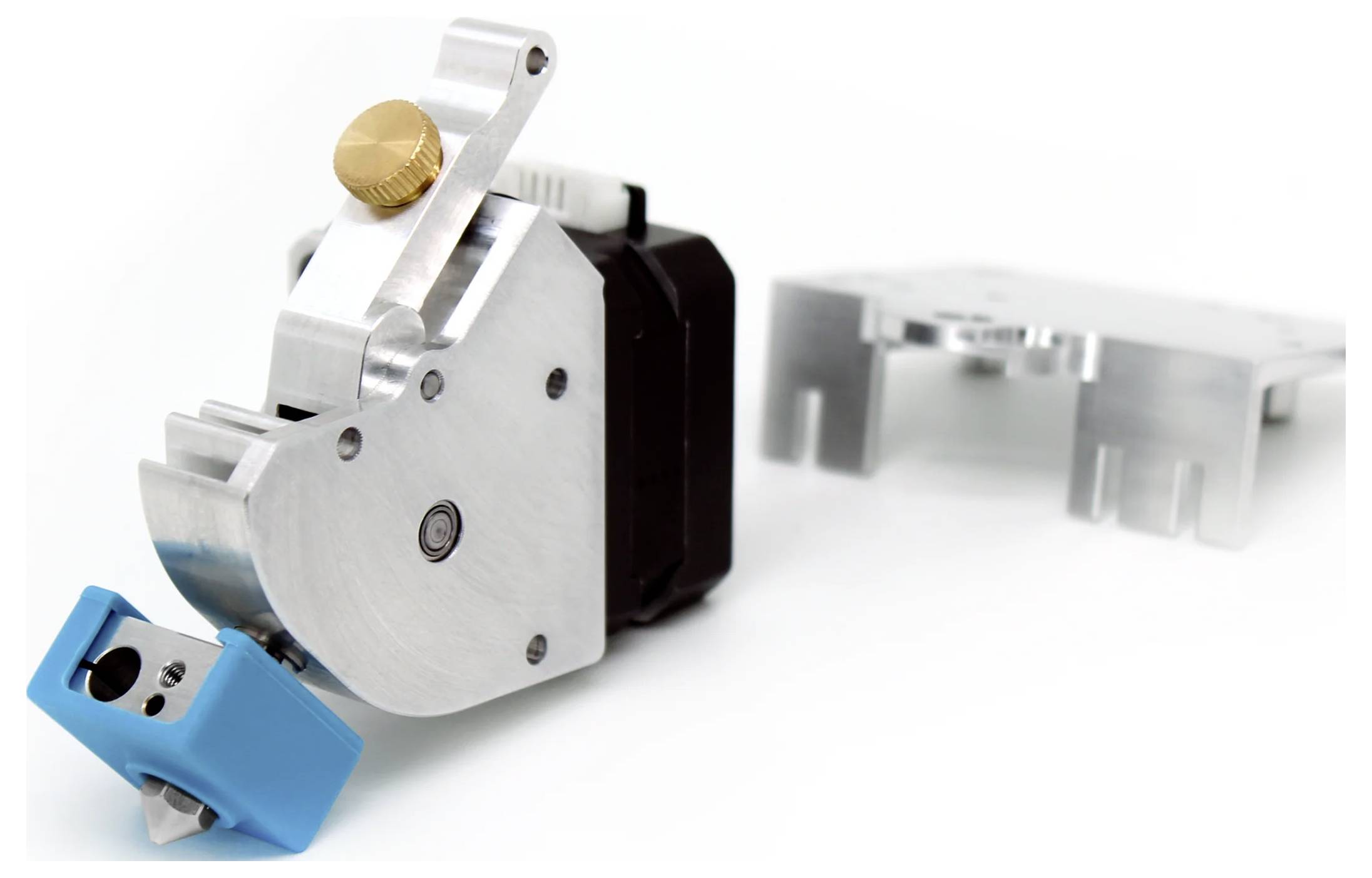 A metal device with a golden adjustment screw and blue plastic components, likely part of a mechanical or technical system.