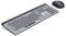 Wireless keyboard with translucent keys and accompanying mouse on a white background, showcasing a modern, sleek design.