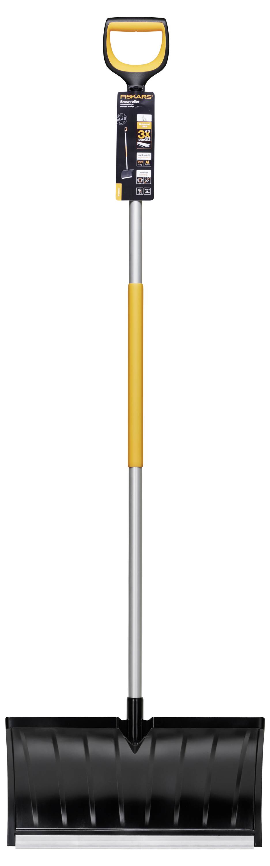 Snow shovel with a yellow handle and black blade stands vertically. Suitable for removing snow and ice from pavements.